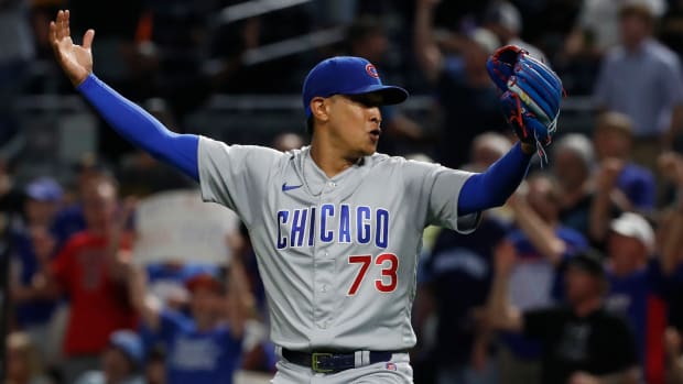 Aug 24, 2023; Pittsburgh, Pennsylvania, USA; Chicago Cubs relief pitcher Adbert Alzolay (73) reacts after the final out is secured to defeat the Pittsburgh Pirates at PNC Park. Chicago won 5-4 in ten innings. Mandatory Credit: Charles LeClaire-USA TODAY Sports